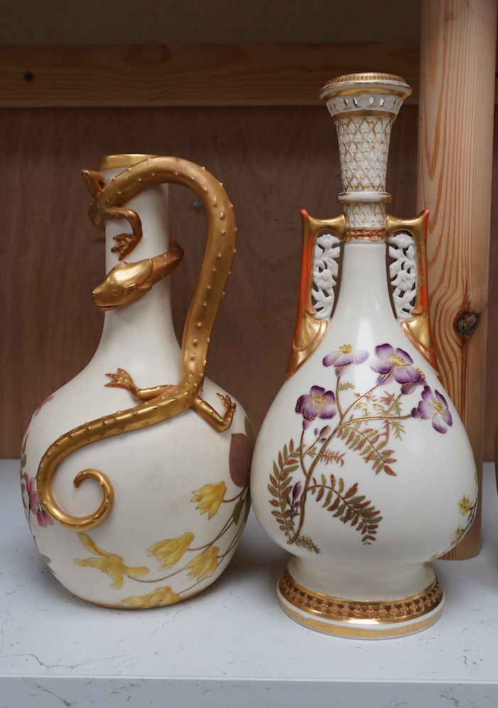 Two Worcester ivory ground vases, shape numbers 942 and 260, tallest 25.5cm. Condition - poor to fair, crack through dragons body at the highest point, wear to gilding of both pieces